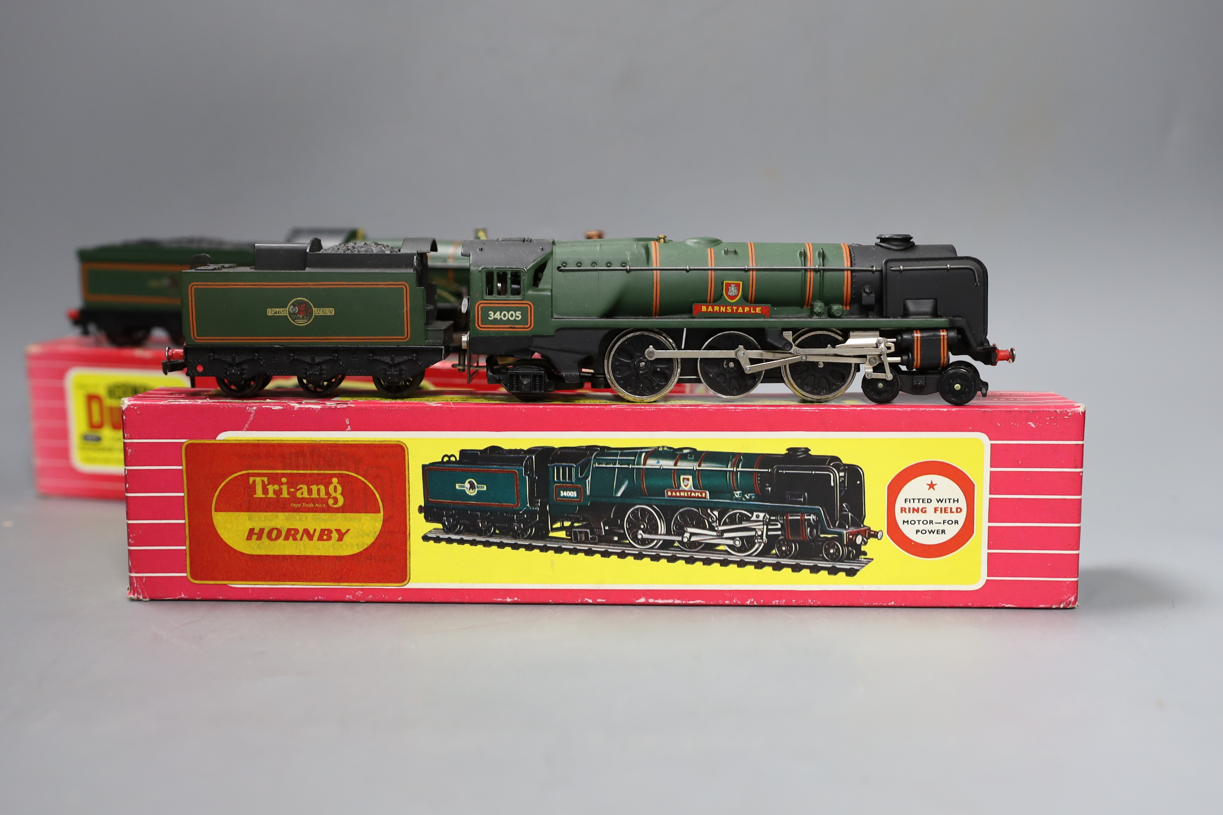 Two boxed Hornby Dublo locomotives and tenders – 2221 Cardiff Castle locomotive and tender and 2235 West Country locomotive Barnstaple and tender